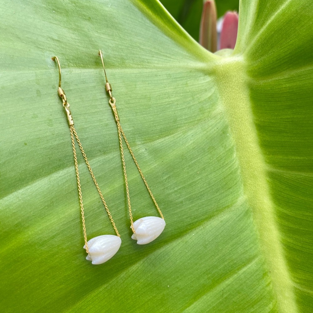 Triangle earrings with vintage pikake